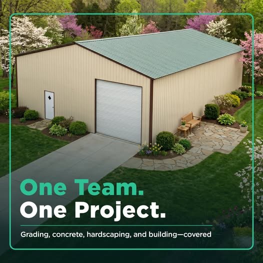 Ad: cream metal building with a concrete driveway and stone walkway. One team. One project. Grading, concrete, hardscaping, and building, covered.
